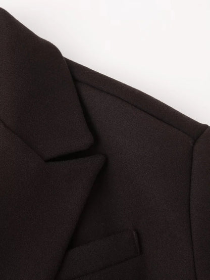 Cappotto di lana con nappe disponibile in varie colorazioni S,M,L