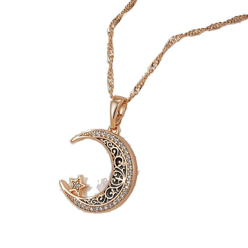 Bigiotteria- collana  oro rosa con stella e luna, in zircone smaltato