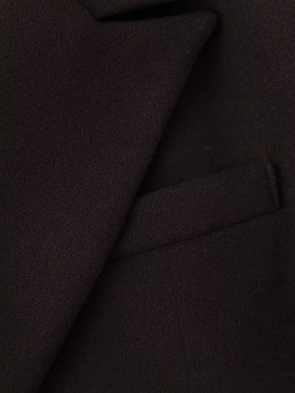 Cappotto di lana con nappe disponibile in varie colorazioni S,M,L