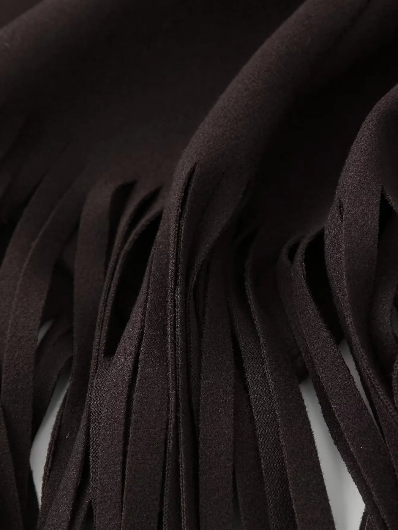 Cappotto di lana con nappe disponibile in varie colorazioni S,M,L