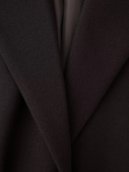 Cappotto di lana con nappe disponibile in varie colorazioni S,M,L