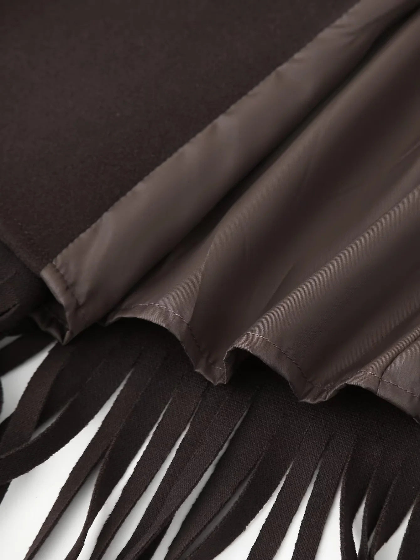 Cappotto di lana con nappe disponibile in varie colorazioni S,M,L