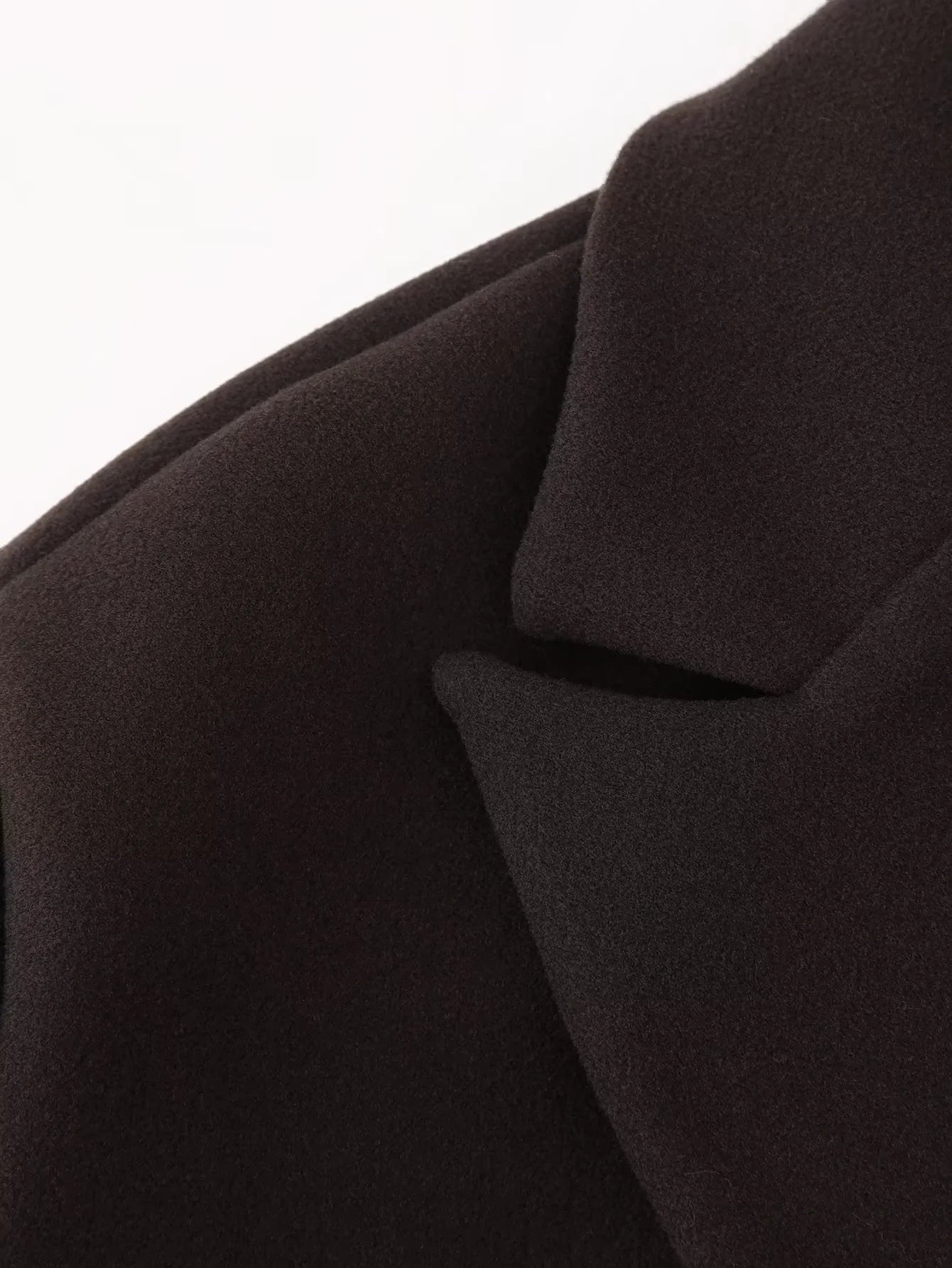 Cappotto di lana con nappe disponibile in varie colorazioni S,M,L